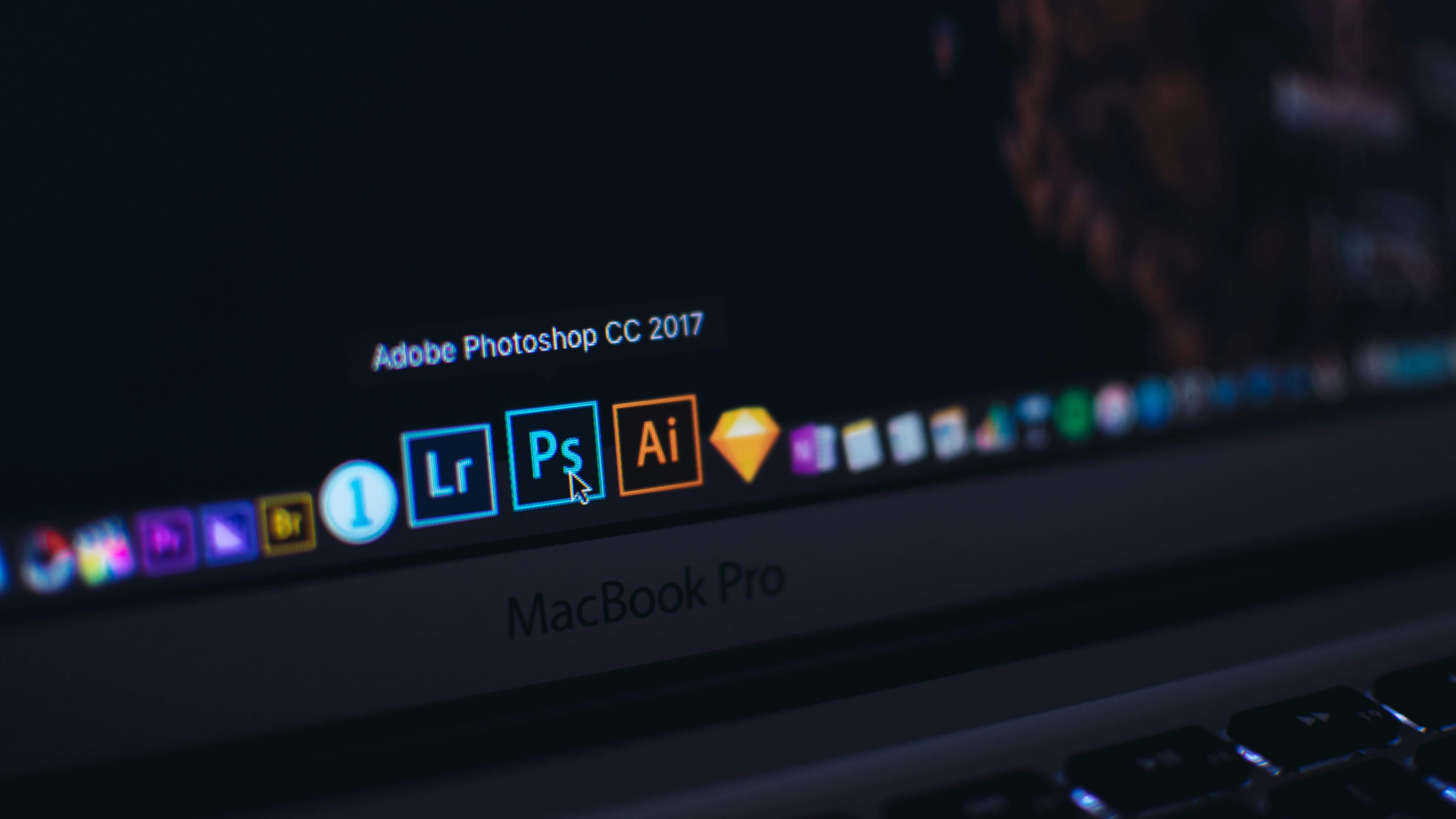 turned on MacBook Pro showcasing AI content creation platforms